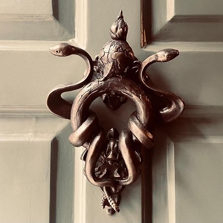Chateau Denmark London Exterior photo Door knocker at the entrance to the house